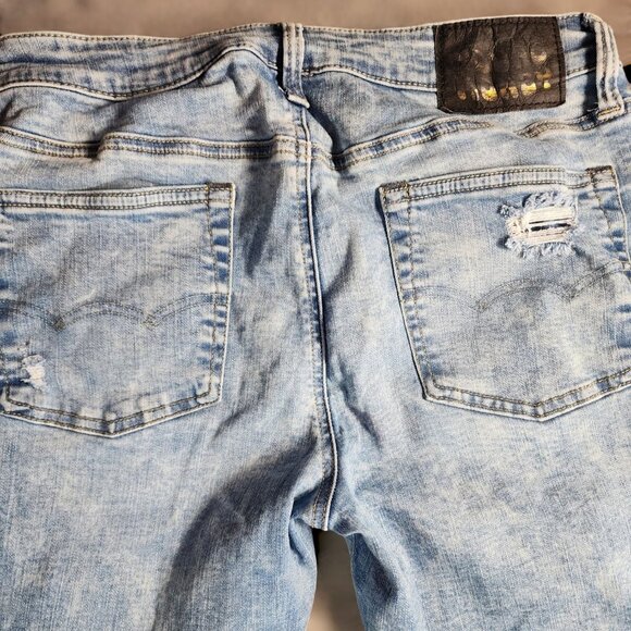 AMERICAN EAGLE x YOUNG MONEY Stacked Skinny Jeans 34 x 30 Distressed Light Wash - Picture 5 of 9